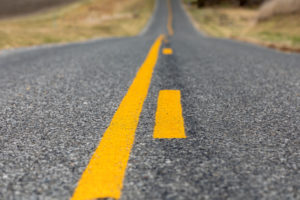 if you're on the side of the road with the broken yellow line on it, it means you are allowed to pass.